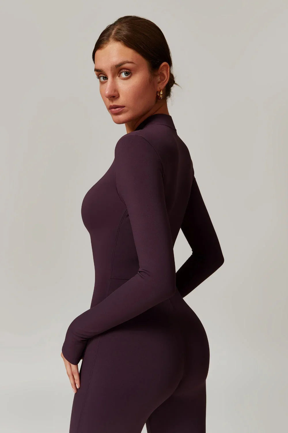 Althea | Damski dopasowany kombinezon z długim rękawem